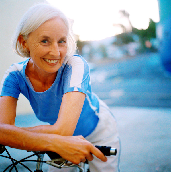 older woman riding a bike