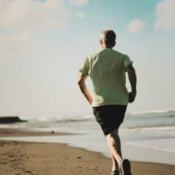 Man running on the beach.