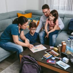 Family of four putting together the emergency plan