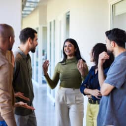 Woman talking with her coworkers