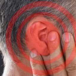Close up of ear with tinnitus