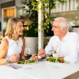 Happy couple on a date at a romantic outdoor cafe