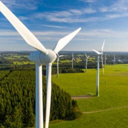 Shot of large industrial windmills in the countryside